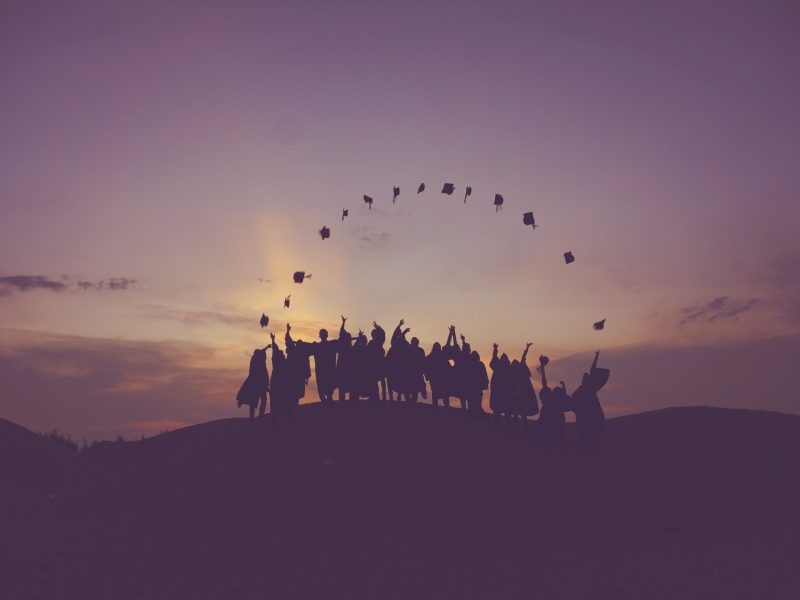 Photo of students depicting a graduation